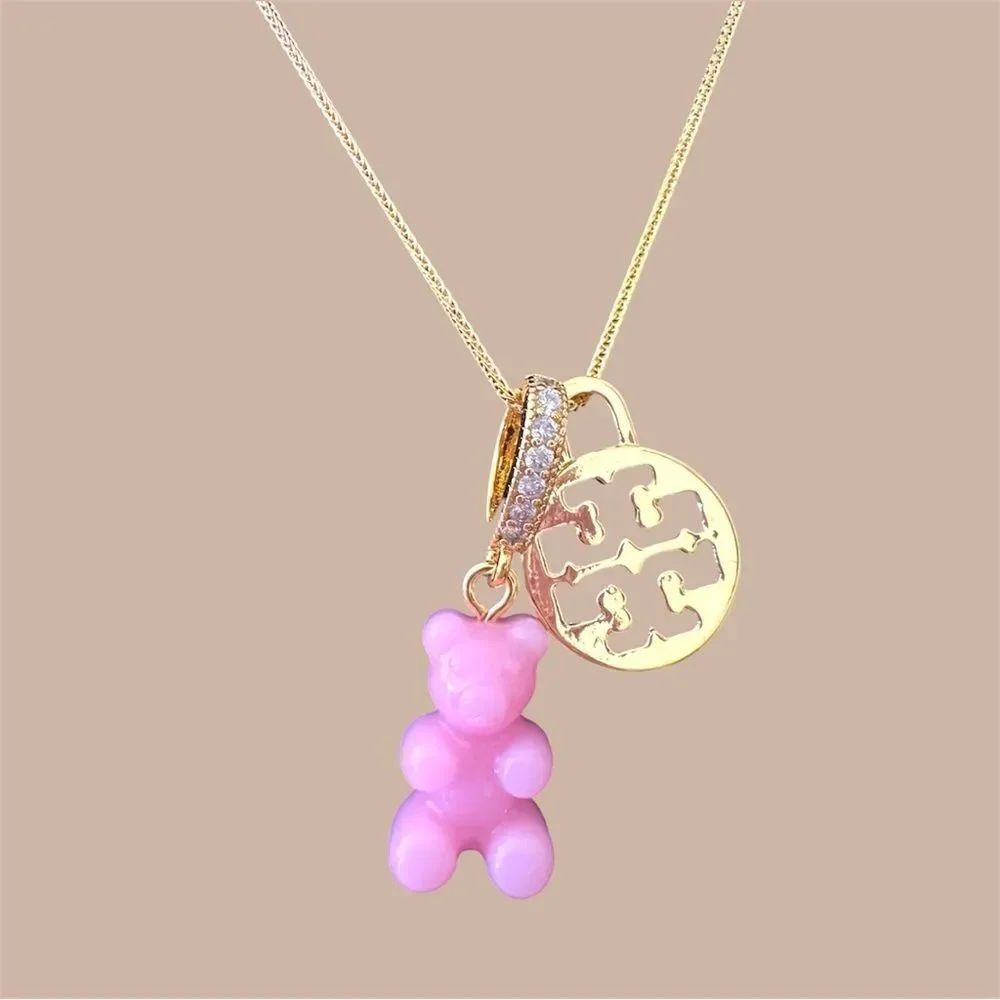 TORY BURCH 18K GOLD LOGO CHARM WITH NOSTALGIC GUMMY BEAR CHARM PENDANT N…